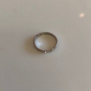 Size 5/6 silver ring with singular “diamond”